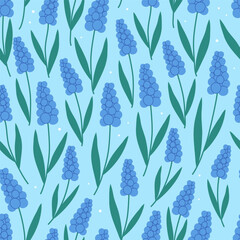 Seamless pattern with blue muscari flowers with green leaves on a light blue background. Hand drawn vector illustration for spring designs, textiles, wallpaper, stationery, and decorative branding.
