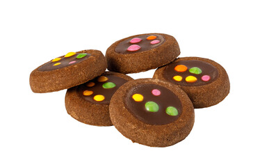 Chocolate cookies stacking with colorful candy toppings