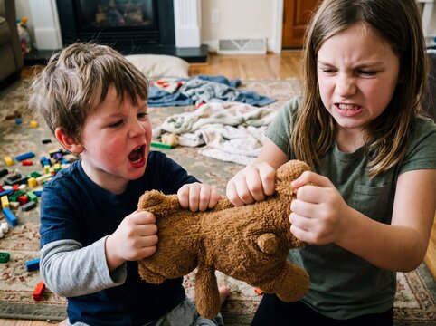 Angry siblings fighting over a teddy bear in a messy living room with scattered toys, capturing a chaotic moment of intense sibling rivalry.