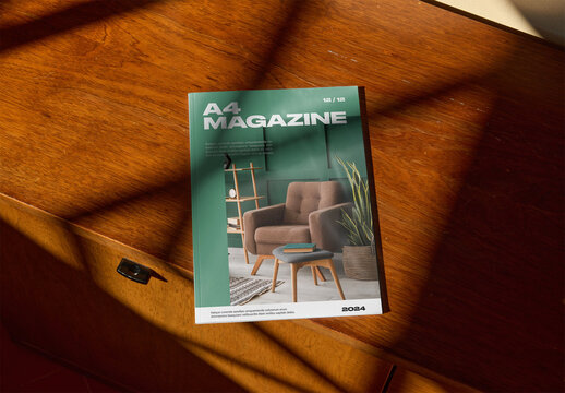Mockup Of A4 Magazine With Customizable Front Cover On Table
