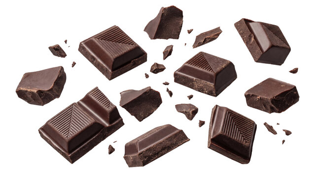 dark chocolate pieces and crumbs scattered on a transparent background, a delicious sweet treat.