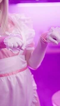 Headless cute anime cosplay pink maid girl show kitten nyan pose