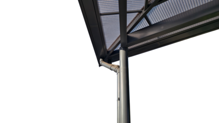 Modern architectural canopy featuring black steel frame translucent polycarbonate roofing and integrated drainage system with downspouts and gutters. Isolated on transparent background