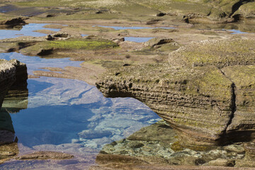 Gran Canaria, textures of the rocks of El Confital beach on the edge of Las Palmas de Gran Canaria, low tide
