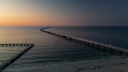 Obraz premium Aerial view of Busselton Jetty at sunset, Western Australia