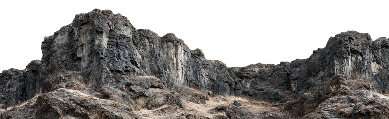 Naklejka premium Jagged, rocky mountain range against a stark black background, showcasing weathered surfaces