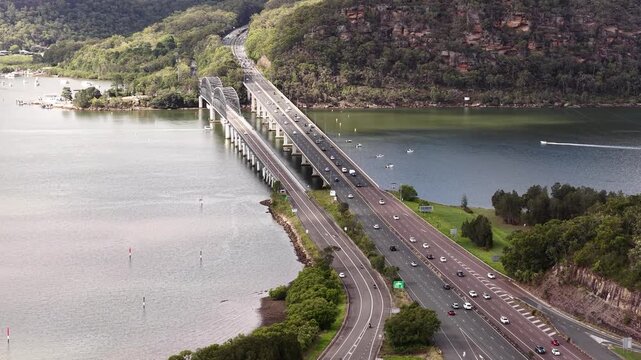 No sky aerial view over Hawkesbury river bridges on Australian M1 motorway at Mooney Mooney.