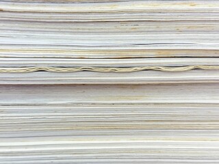 Piles of old papers were stacked on top of each other.