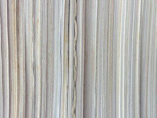 Piles of old papers were stacked on top of each other.