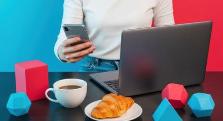 Woman enjoying breakfast while working on laptop and checking phone