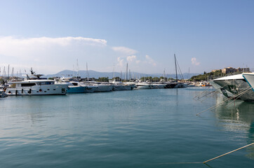 Fototapeta premium Luxury yachts and motorboats moored at port Vauban in Antibes, French Riviera, France