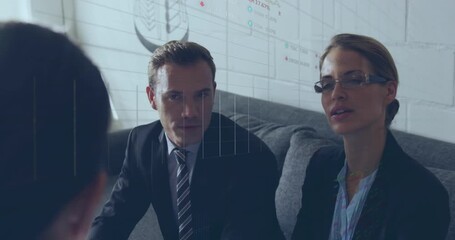 Animation of stock market data processing over diverse businesspeople discussing at office - Powered by Adobe
