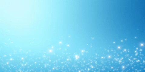 Fototapeta premium Magical winter background featuring abstract blue snowflakes and stars on a cold ice backdrop for Christmas holiday wallpaper