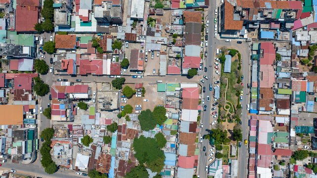 Aerial view of the bustling city streets, where colorful rooftops meet the organized chaos of urban life, Maputo, Cidade de Maputo, Mozambique.