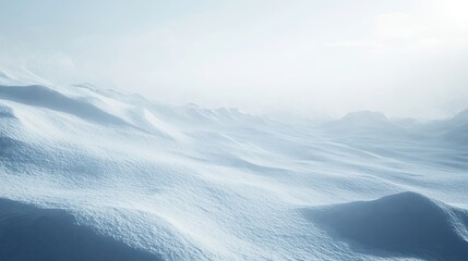 Winter landscape with swirling snow covering the mountain range