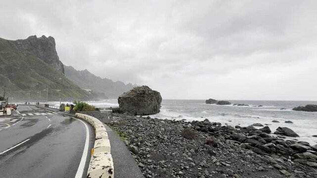 Stormy coast with cliffs and beach at Roque de las Bodegas, Tenerife