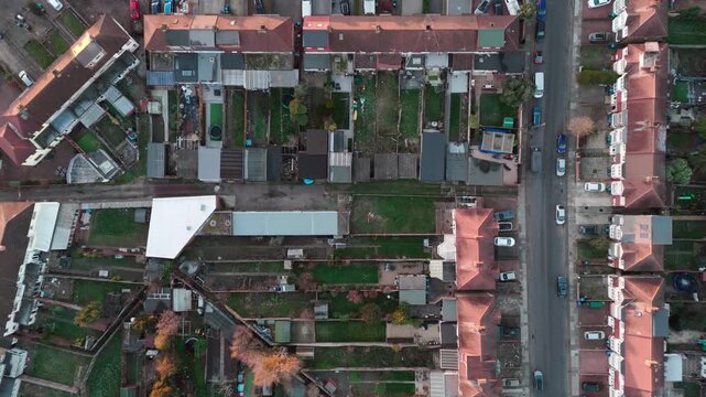 Aerial top-down view of a residential area with gardens and streets in Enfield, UK
