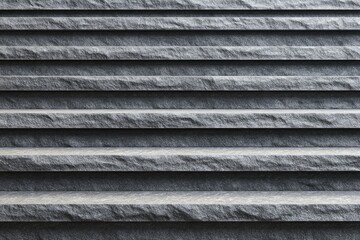 Close-up of dark gray, horizontally grooved surface; textured, natural appearance