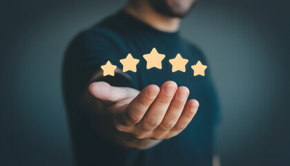 Man in blue sweater shows five gold stars rating on his hand palm up  customer review concept