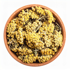 Top view of dried yarrow herb (Achillea millefolium) in a wooden bowl on white background. Traditional medicinal plant used for herbal tea, natural remedies and wellness products.