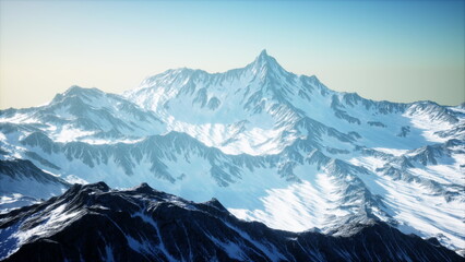 A stunning view of towering snow capped mountains emerges as the first light of dawn breaks over the horizon. The landscape is adorned with ridges and valleys, showcasing natures beauty.
