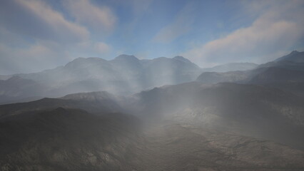 Fototapeta premium In the early morning light, soft mist envelops majestic mountains, creating an ethereal atmosphere. The landscape is calm, with valleys gently fading into the distance, inviting peace and reflection.