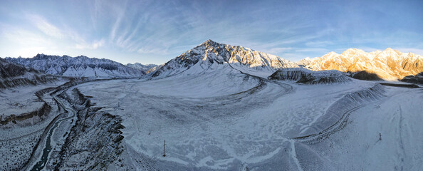 a beautiful mountain river in a snowy gorge. highlands. winter in the mountains