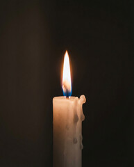 Burning candle with flame illuminating dark background for Qingming Festival  