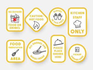 Kitchen area signs displaying food safety instructions, staff restrictions, and ordering procedures. These signs promote hygiene and ordering in the food service industry.