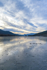 Embrun, beautiful city in France, in the Hautes-Alpes, the Serre-Poncon lake frozen in winter
