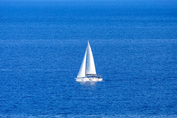 Sailboat sailing boat on the Aegean Mediterranean Sea vacation near Rhodes island, Greece