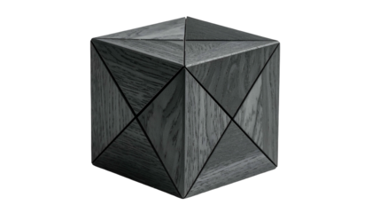 Geometric wooden cube with triangular facets, dark grain, and sharp lines