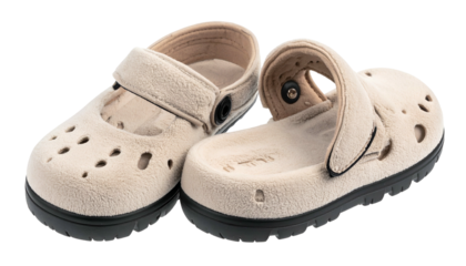 Beige, plush shoes, one with Mary Jane strap, the other open-backed. Black soles