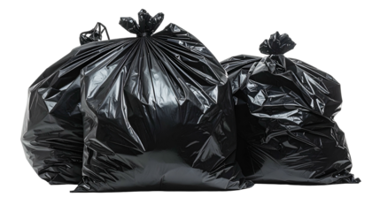 Three tightly sealed, black plastic trash bags, ready for disposal, sit in a group