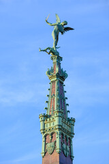 Anspach Fountain obelisk in the centre of the Place de Brouckere or De Brouckereplein square in Brussels, Belgium