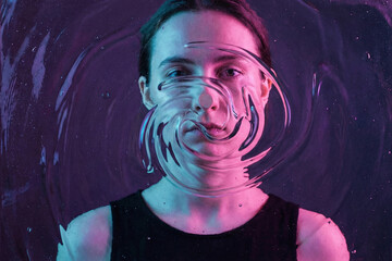 Surreal portrait of woman behind distorted glass representing identity crisis and mental health anxiety