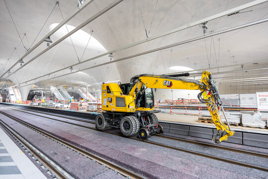Wheel Excavator M323F inside new main railway train station Stuttgart 21 construction site in Stuttgart, Germany