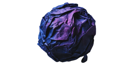 Close-up of a tightly bunched, wrinkled object with a gradient of purple and blue hues