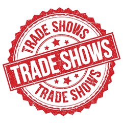 TRADE SHOWS text on red round stamp sign