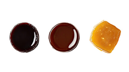 Top-down view of dark syrups and honey on transparent background