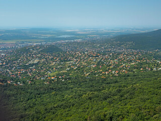 Twenty-fifth image in a series showing a panoramic view of the city of P&eacute;cs, Hungary, photographed from the observation deck of the TV tower. Elevated perspective highlighting the urban landscape, roo