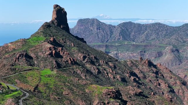 Roque Bentayga Aerial View with Mount Teide and Tenerife in Background, Gran Canaria Highlands, Spain - 4K Cinematic Summit