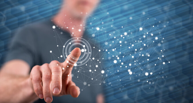 Man touching a network concept - Powered by Adobe
