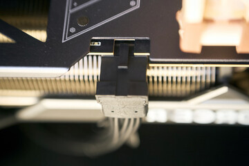 PCIe Gen 5 12VHPWR power cable attached to GPU