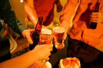 A blurry image of businessmen at a lavish office party.