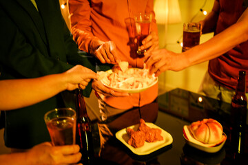 A blurry image of businessmen at a lavish office party.