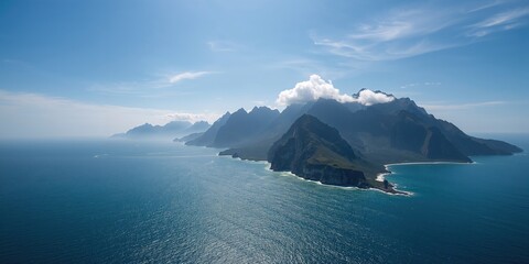 Mountain range along a shoreline viewed from the coast, serving as a scenic natural backdrop
