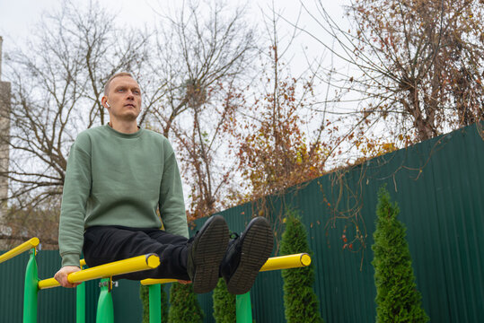 Man exercising outdoors in an autumn setting