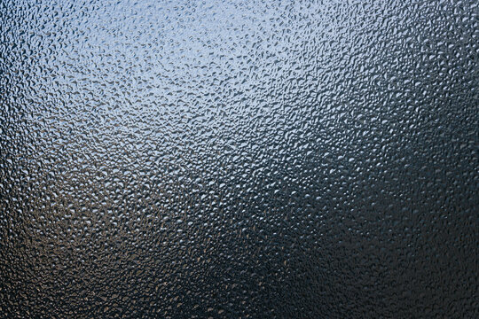 Textured glass surface with natural abstract design