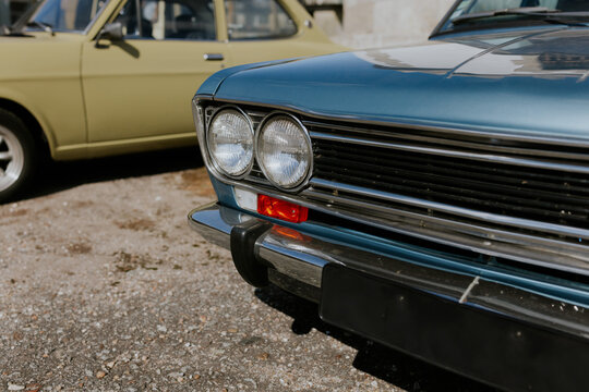 Classic vintage cars parked in the sun